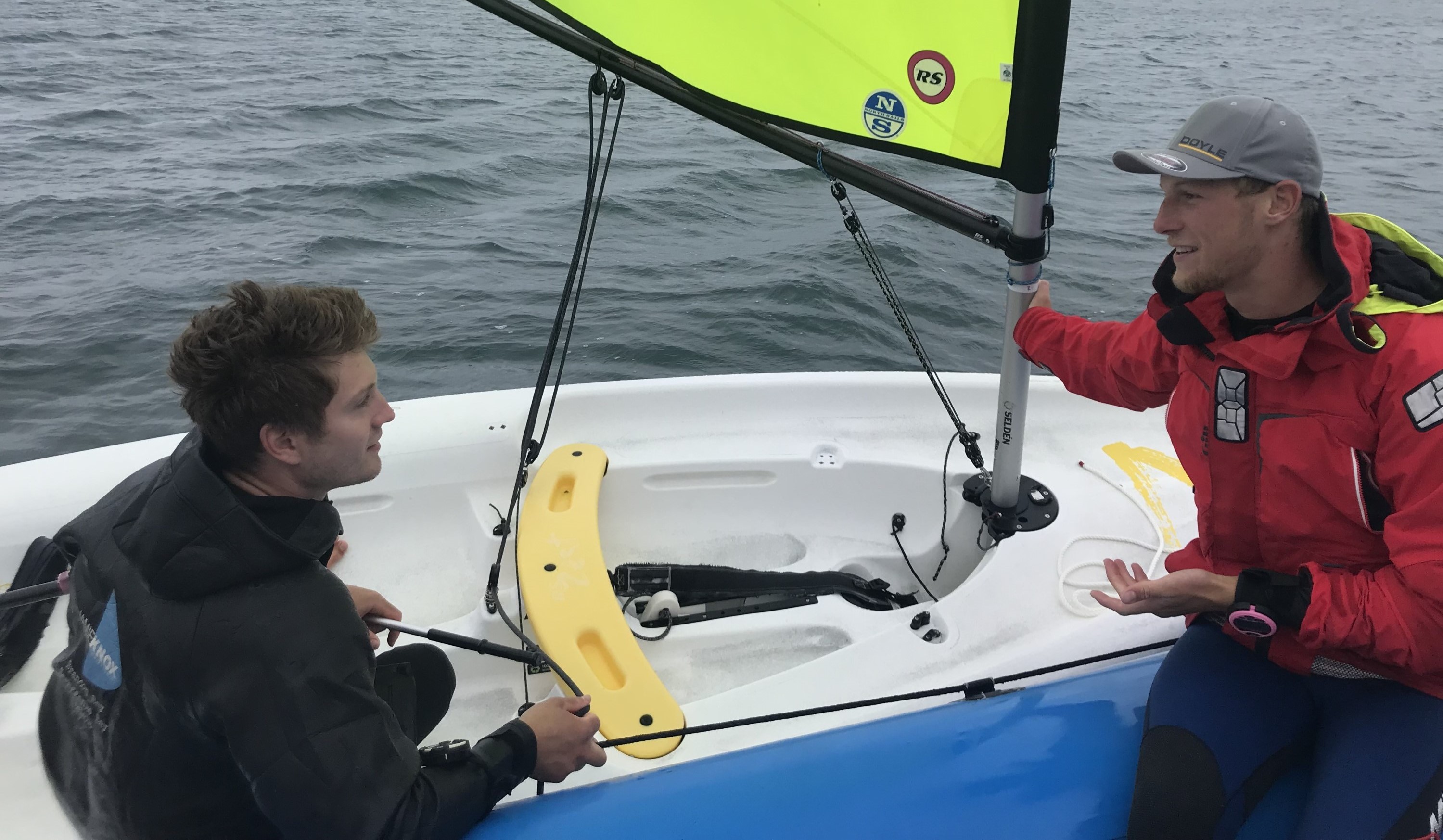 Sailor to Coach camp Summer 2022 L-R Andy & Alex on the water at WPNSA for a session as part of the RYA Race Coach Level 2 course.