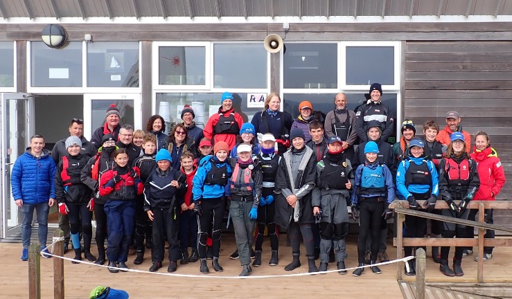 Full squad line-up of juniors, volunteers and instructors