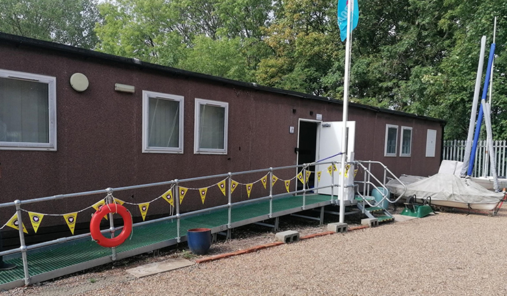 Two pictures of sheds and compound used by LRYSA before the opening of the new clubhouse.