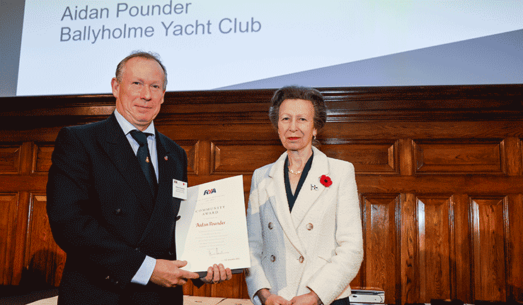 Aidan Pounder receiving his lifetime commitment award from Her Royal Highness Princess Anne