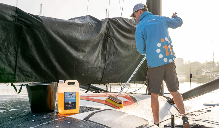 RYA member offers November 2022. Man cleaning boat with Ecoworks products and brush