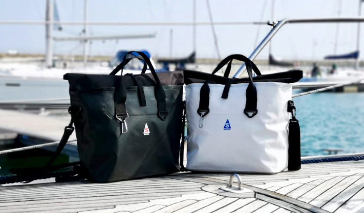 RYA member offers November 2022. 2 Sacqua bags on pontoon, boats can be seen behind.