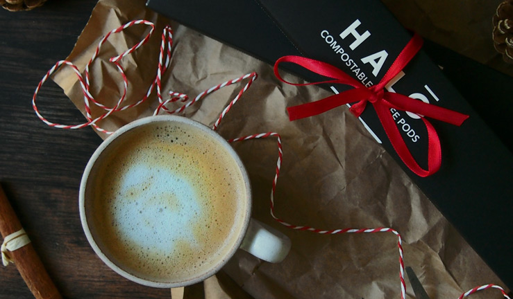 December member offers. Birds eye image of coffee on table with halo coffee christmas gift