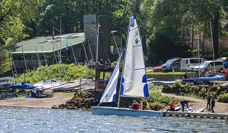 View of Rudyard Lake SC clubhouse from the water.