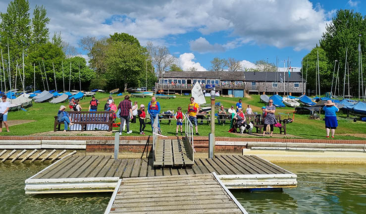 People on shore on a sunny day at Banbury SC.