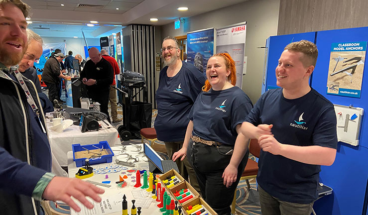 happy people exploring stalls at the training conference