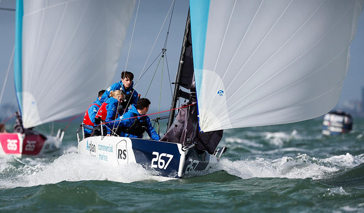 Team from Strathclyde University Sailing Club in action sailing RS21 downwind in 2022 British Keelboat League