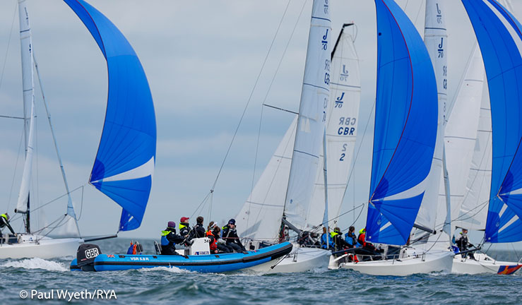 BKA sailing downwind in J70s with coach boat at Cowes 2023