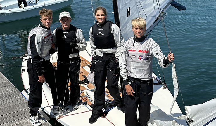 Two teams aboard Elliott 6m keelboats match racing upwind in Portland Harbour for the RYA Harken Youth Match Racing Championship 2023