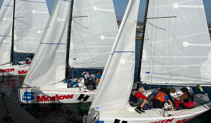 Youngsters in three of the keelboats