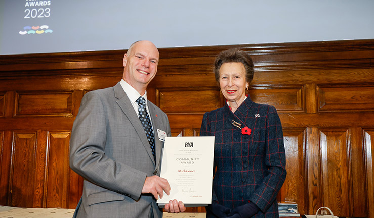 Jacob Knock is presented with an RYA Volunteer Award by HRH The Princess Royal.