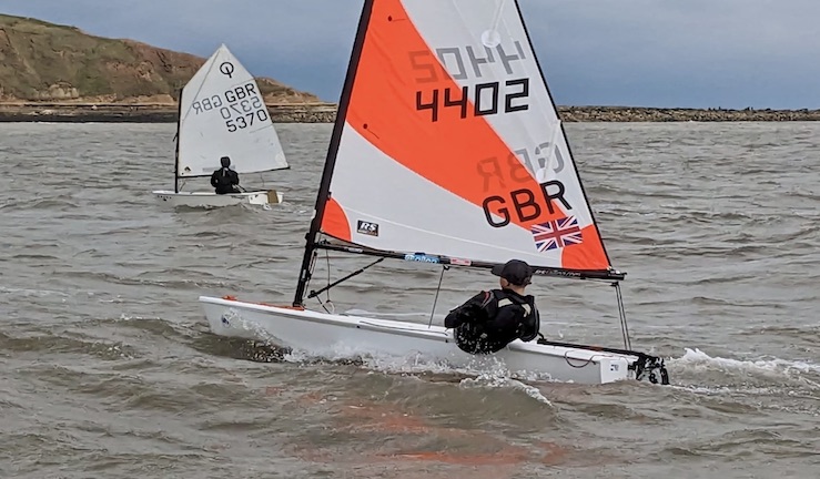 RS Tera sailor and RS Optimist sailor on the North Sea with the NE & Yorkshire Youth Traveller Series 2023.